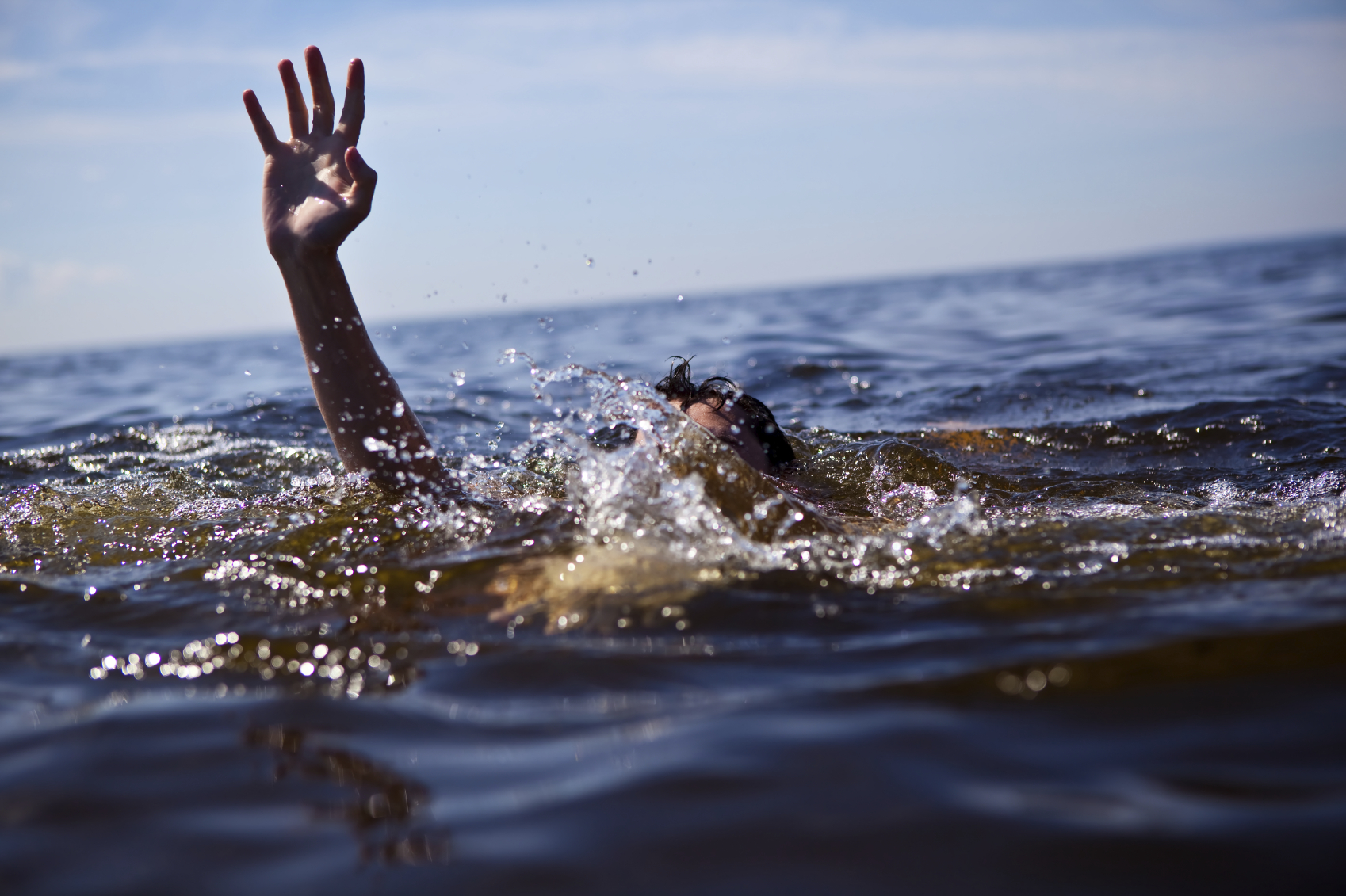 Swim Safely: Know the 8 Warning Signs of Drowning